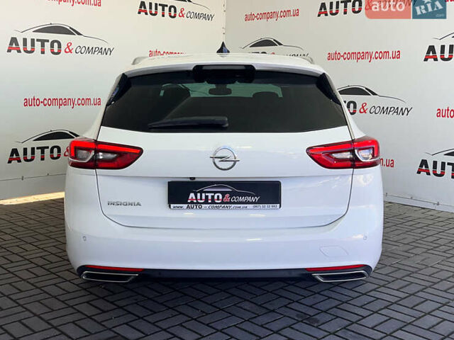 Белый Опель Инсигния, объемом двигателя 1.96 л и пробегом 145 тыс. км за 19750 $, фото 3 на Automoto.ua