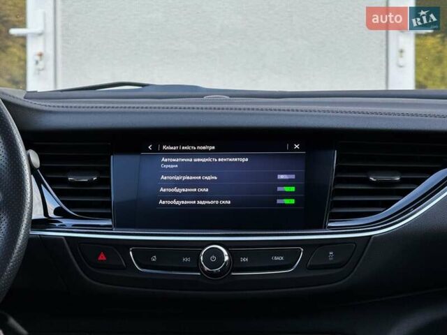 Белый Опель Инсигния, объемом двигателя 2 л и пробегом 169 тыс. км за 20999 $, фото 90 на Automoto.ua