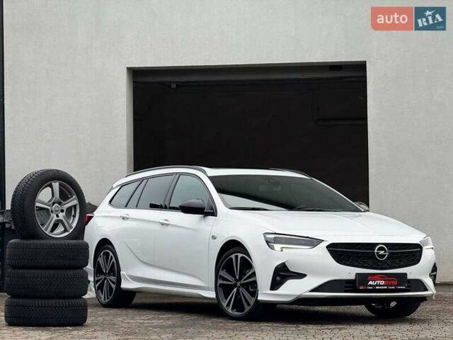 Белый Опель Инсигния, объемом двигателя 2 л и пробегом 169 тыс. км за 20999 $, фото 1 на Automoto.ua