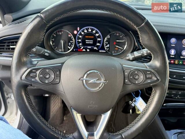 Білий Опель Інсігнія, об'ємом двигуна 2 л та пробігом 103 тис. км за 14500 $, фото 9 на Automoto.ua