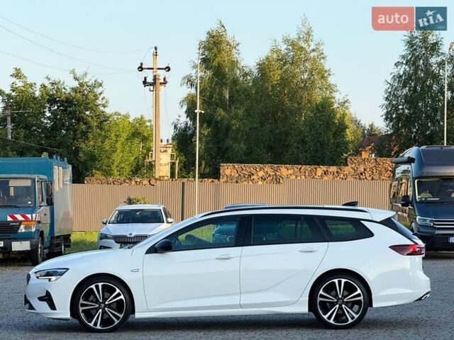 Белый Опель Инсигния, объемом двигателя 2 л и пробегом 169 тыс. км за 21999 $, фото 6 на Automoto.ua