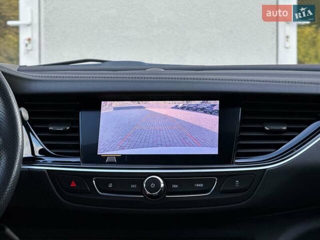 Белый Опель Инсигния, объемом двигателя 2 л и пробегом 169 тыс. км за 20999 $, фото 88 на Automoto.ua