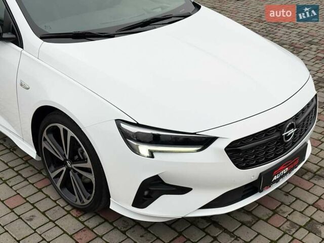 Белый Опель Инсигния, объемом двигателя 2 л и пробегом 169 тыс. км за 20999 $, фото 10 на Automoto.ua