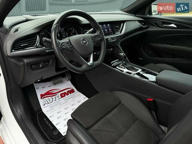 Белый Опель Инсигния, объемом двигателя 2 л и пробегом 169 тыс. км за 20999 $, фото 43 на Automoto.ua