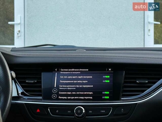 Белый Опель Инсигния, объемом двигателя 2 л и пробегом 169 тыс. км за 20999 $, фото 92 на Automoto.ua