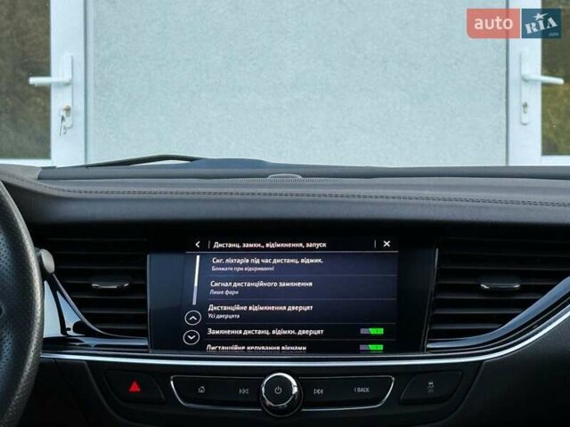 Белый Опель Инсигния, объемом двигателя 2 л и пробегом 169 тыс. км за 20999 $, фото 97 на Automoto.ua