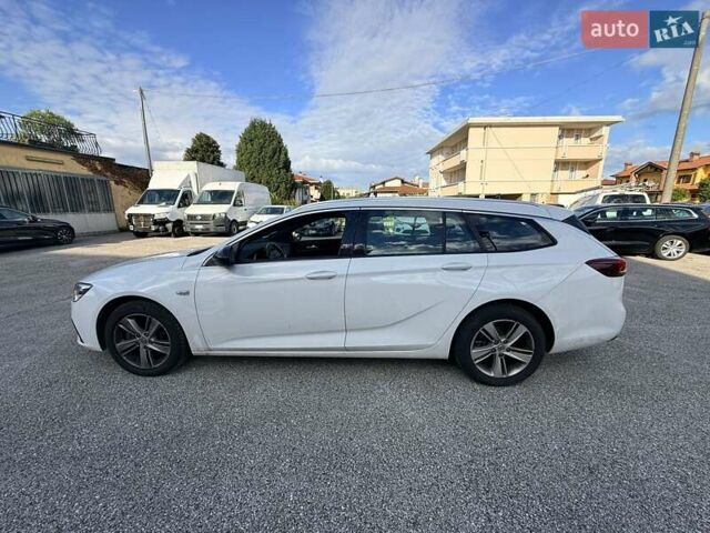 Білий Опель Інсігнія, об'ємом двигуна 2 л та пробігом 103 тис. км за 14500 $, фото 18 на Automoto.ua