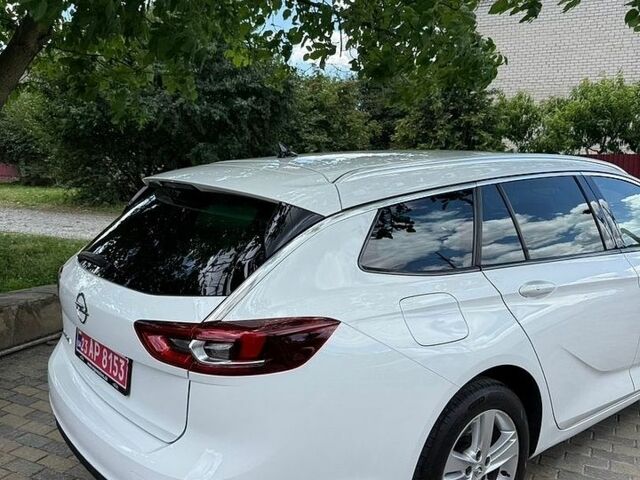 Білий Опель Інсігнія, об'ємом двигуна 1.96 л та пробігом 204 тис. км за 16900 $, фото 13 на Automoto.ua