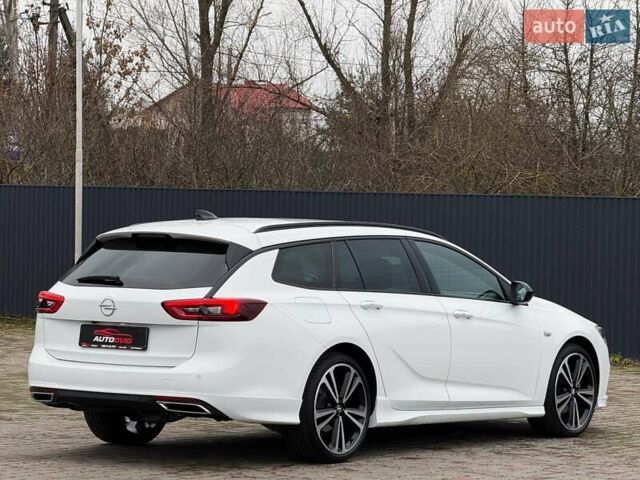 Белый Опель Инсигния, объемом двигателя 2 л и пробегом 169 тыс. км за 20999 $, фото 4 на Automoto.ua