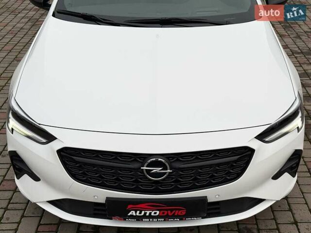 Белый Опель Инсигния, объемом двигателя 2 л и пробегом 169 тыс. км за 20999 $, фото 11 на Automoto.ua