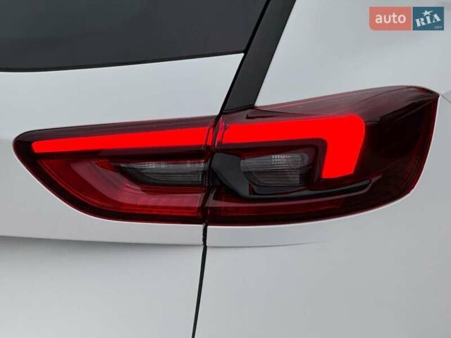 Белый Опель Инсигния, объемом двигателя 2 л и пробегом 169 тыс. км за 20999 $, фото 26 на Automoto.ua