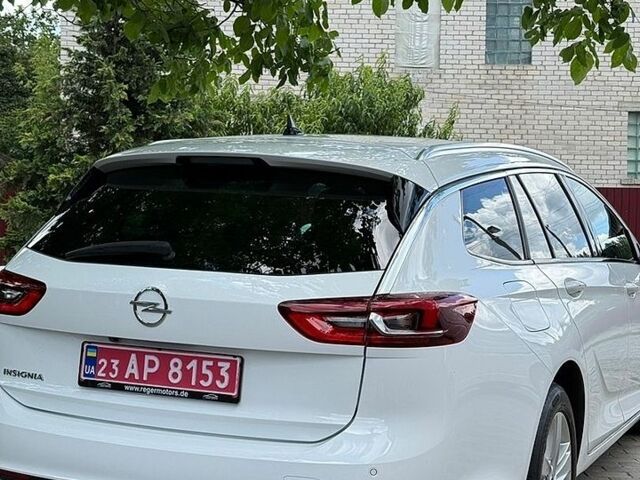 Білий Опель Інсігнія, об'ємом двигуна 1.96 л та пробігом 204 тис. км за 16900 $, фото 12 на Automoto.ua