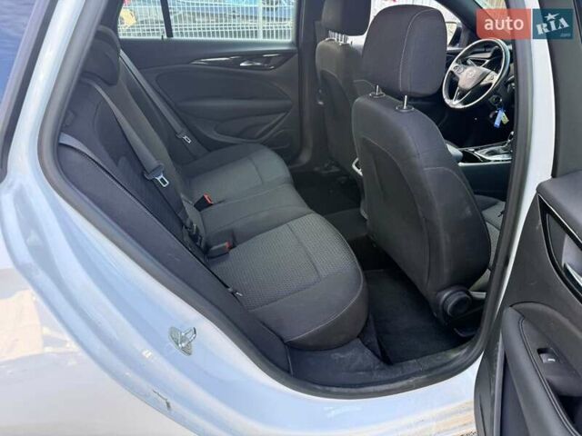 Білий Опель Інсігнія, об'ємом двигуна 2 л та пробігом 103 тис. км за 14500 $, фото 22 на Automoto.ua