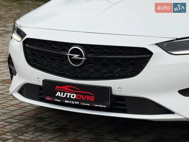Белый Опель Инсигния, объемом двигателя 2 л и пробегом 169 тыс. км за 20999 $, фото 19 на Automoto.ua