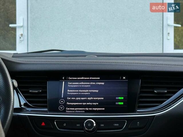 Белый Опель Инсигния, объемом двигателя 2 л и пробегом 169 тыс. км за 20999 $, фото 91 на Automoto.ua