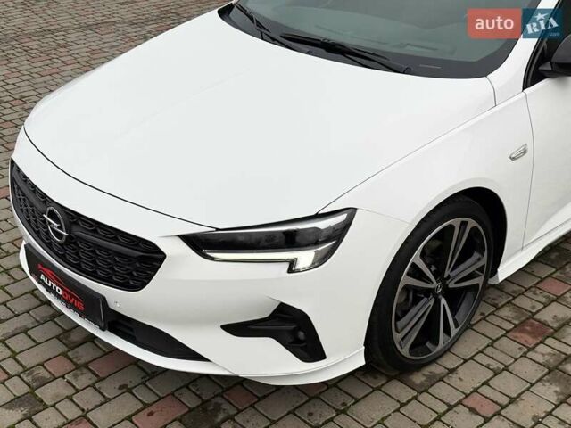 Белый Опель Инсигния, объемом двигателя 2 л и пробегом 169 тыс. км за 20999 $, фото 12 на Automoto.ua