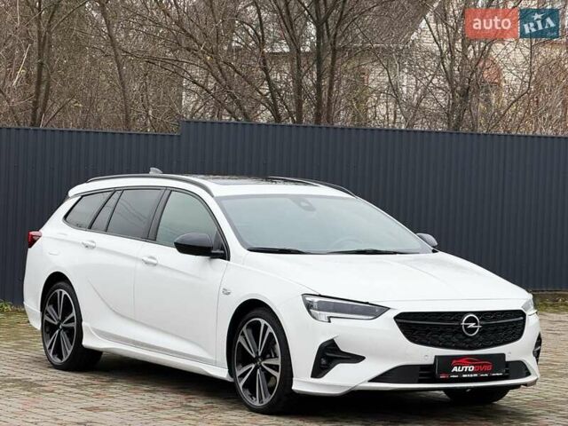 Белый Опель Инсигния, объемом двигателя 2 л и пробегом 169 тыс. км за 20999 $, фото 2 на Automoto.ua