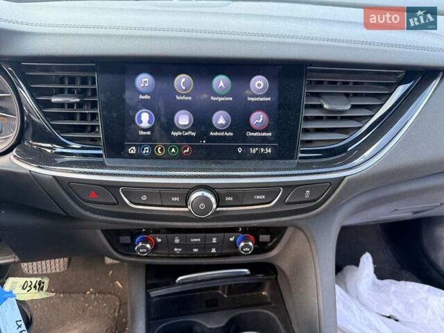 Білий Опель Інсігнія, об'ємом двигуна 2 л та пробігом 103 тис. км за 14500 $, фото 7 на Automoto.ua