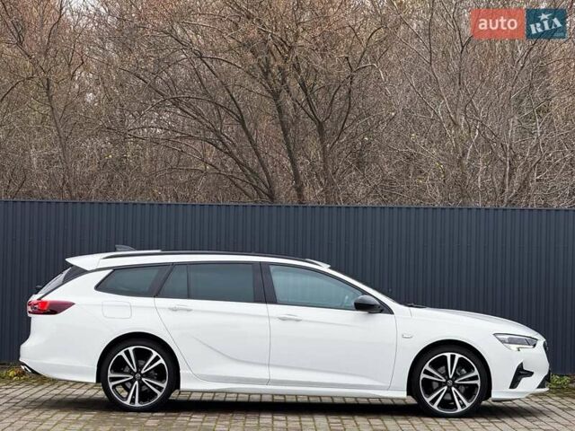 Белый Опель Инсигния, объемом двигателя 2 л и пробегом 169 тыс. км за 20999 $, фото 3 на Automoto.ua