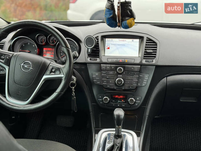Білий Опель Інсігнія, об'ємом двигуна 2 л та пробігом 204 тис. км за 9500 $, фото 9 на Automoto.ua