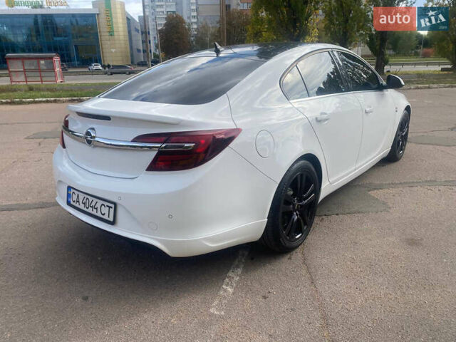Белый Опель Инсигния, объемом двигателя 2 л и пробегом 285 тыс. км за 9900 $, фото 5 на Automoto.ua