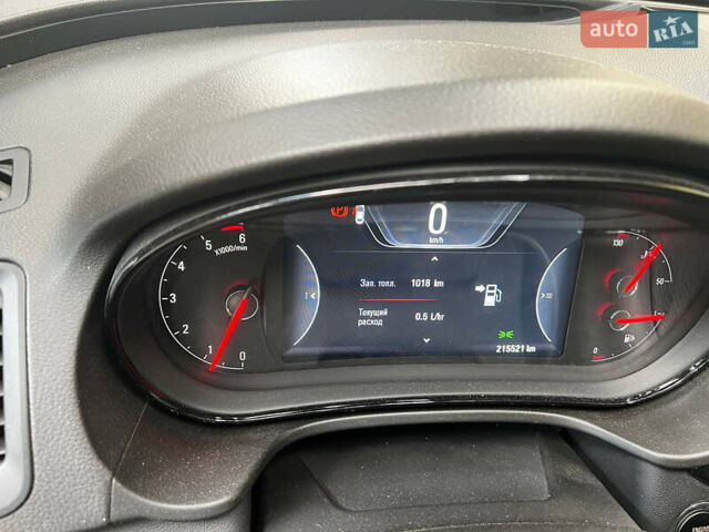 Білий Опель Інсігнія, об'ємом двигуна 1.6 л та пробігом 220 тис. км за 13000 $, фото 8 на Automoto.ua