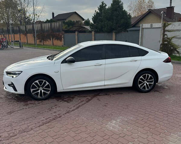 Білий Опель Інсігнія, об'ємом двигуна 1.5 л та пробігом 125 тис. км за 16700 $, фото 5 на Automoto.ua