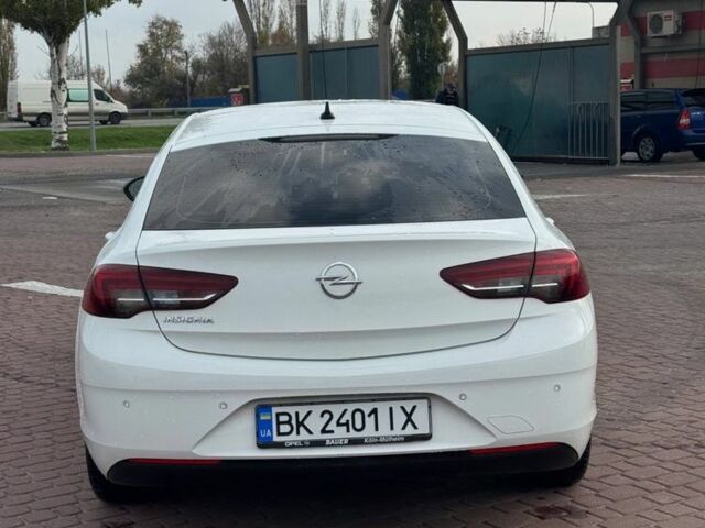 Білий Опель Інсігнія, об'ємом двигуна 1.5 л та пробігом 125 тис. км за 16700 $, фото 3 на Automoto.ua