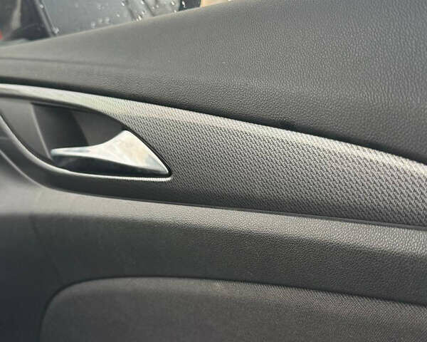 Білий Опель Інсігнія, об'ємом двигуна 1.5 л та пробігом 125 тис. км за 16700 $, фото 23 на Automoto.ua