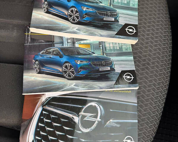 Білий Опель Інсігнія, об'ємом двигуна 1.5 л та пробігом 125 тис. км за 16700 $, фото 24 на Automoto.ua