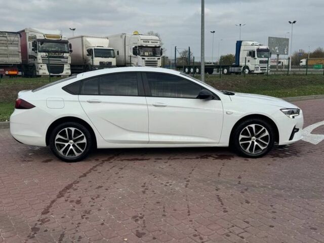 Білий Опель Інсігнія, об'ємом двигуна 1.5 л та пробігом 125 тис. км за 16700 $, фото 7 на Automoto.ua