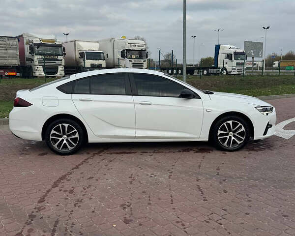 Білий Опель Інсігнія, об'ємом двигуна 1.5 л та пробігом 125 тис. км за 16700 $, фото 7 на Automoto.ua