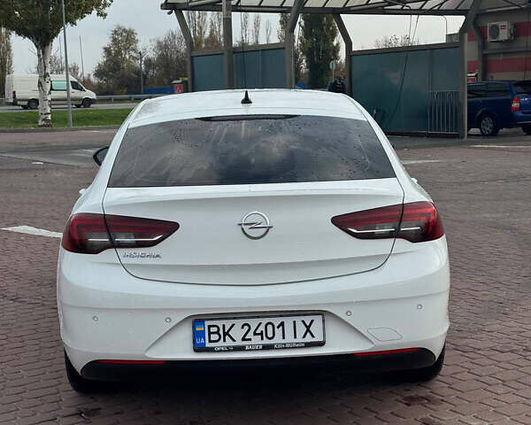 Білий Опель Інсігнія, об'ємом двигуна 1.5 л та пробігом 125 тис. км за 16700 $, фото 3 на Automoto.ua
