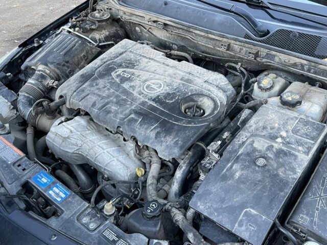 Чорний Опель Інсігнія, об'ємом двигуна 2 л та пробігом 200 тис. км за 5450 $, фото 19 на Automoto.ua