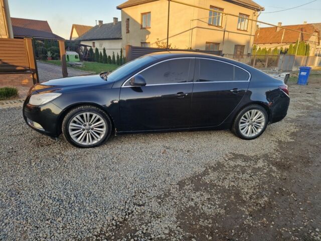 Чорний Опель Інсігнія, об'ємом двигуна 2 л та пробігом 350 тис. км за 6900 $, фото 2 на Automoto.ua