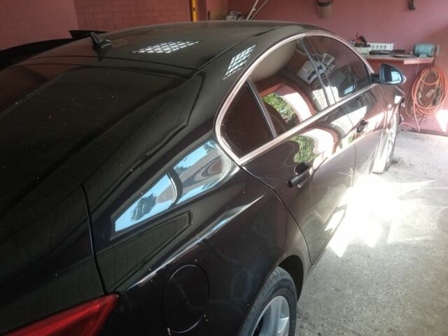 Черный Опель Инсигния, объемом двигателя 1.4 л и пробегом 140 тыс. км за 3709 $, фото 5 на Automoto.ua