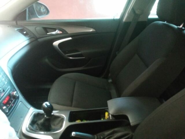 Черный Опель Инсигния, объемом двигателя 1.4 л и пробегом 140 тыс. км за 3709 $, фото 14 на Automoto.ua