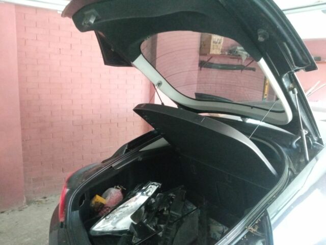 Черный Опель Инсигния, объемом двигателя 1.4 л и пробегом 140 тыс. км за 3709 $, фото 18 на Automoto.ua