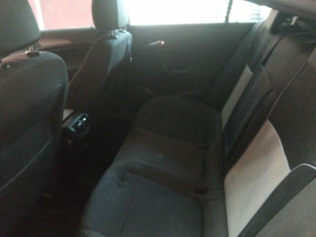 Черный Опель Инсигния, объемом двигателя 1.4 л и пробегом 140 тыс. км за 3709 $, фото 16 на Automoto.ua