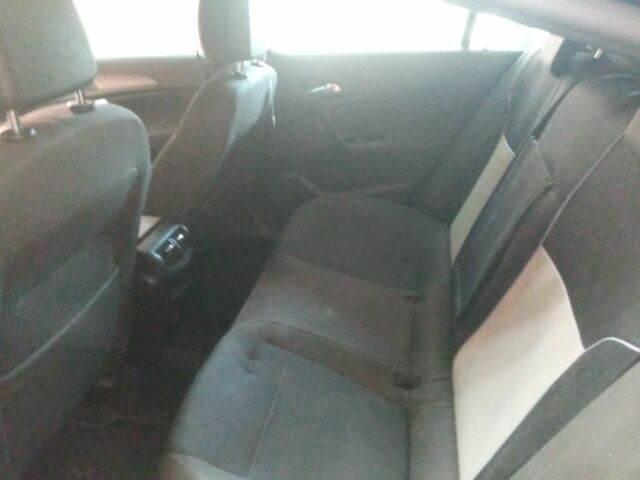 Черный Опель Инсигния, объемом двигателя 1.4 л и пробегом 140 тыс. км за 3709 $, фото 17 на Automoto.ua