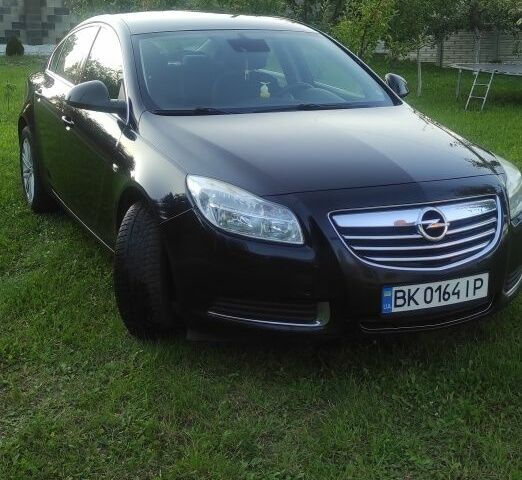 Черный Опель Инсигния, объемом двигателя 2 л и пробегом 321 тыс. км за 7200 $, фото 1 на Automoto.ua