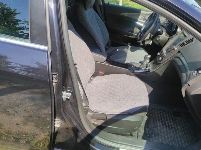 Черный Опель Инсигния, объемом двигателя 2 л и пробегом 321 тыс. км за 7200 $, фото 9 на Automoto.ua