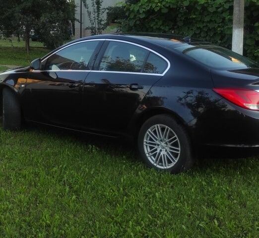 Черный Опель Инсигния, объемом двигателя 2 л и пробегом 321 тыс. км за 7200 $, фото 2 на Automoto.ua