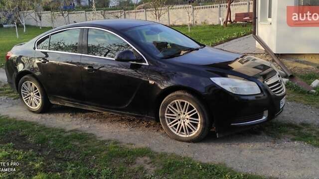 Черный Опель Инсигния, объемом двигателя 2 л и пробегом 318 тыс. км за 7250 $, фото 3 на Automoto.ua
