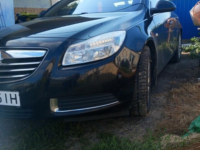 Чорний Опель Інсігнія, об'ємом двигуна 2 л та пробігом 190 тис. км за 7200 $, фото 4 на Automoto.ua