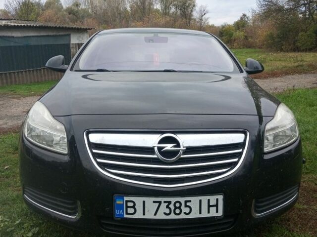 Чорний Опель Інсігнія, об'ємом двигуна 2 л та пробігом 190 тис. км за 7200 $, фото 1 на Automoto.ua