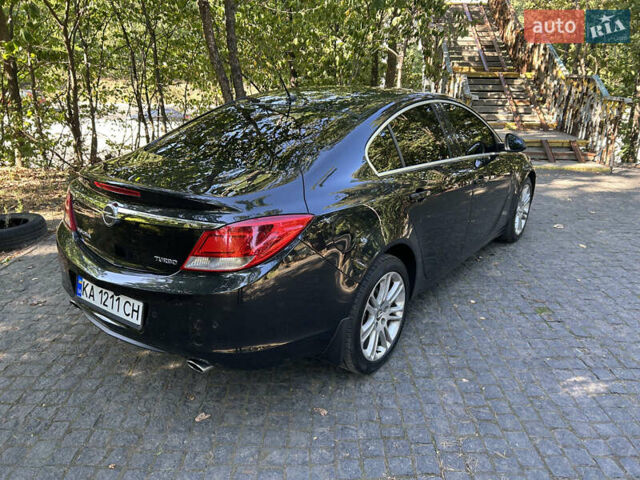 Чорний Опель Інсігнія, об'ємом двигуна 2 л та пробігом 263 тис. км за 7900 $, фото 4 на Automoto.ua