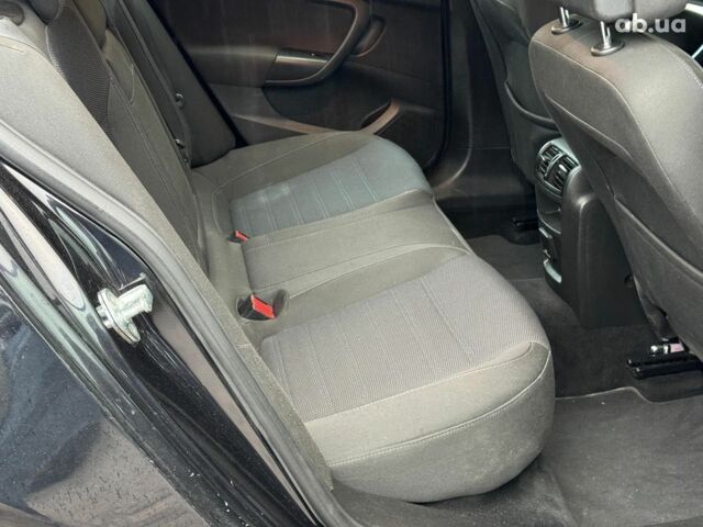 Черный Опель Инсигния, объемом двигателя 1.6 л и пробегом 224 тыс. км за 7890 $, фото 19 на Automoto.ua