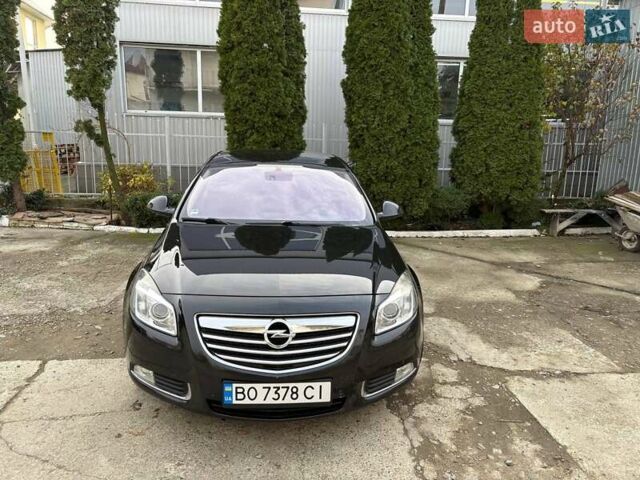 Черный Опель Инсигния, объемом двигателя 2 л и пробегом 282 тыс. км за 8500 $, фото 1 на Automoto.ua