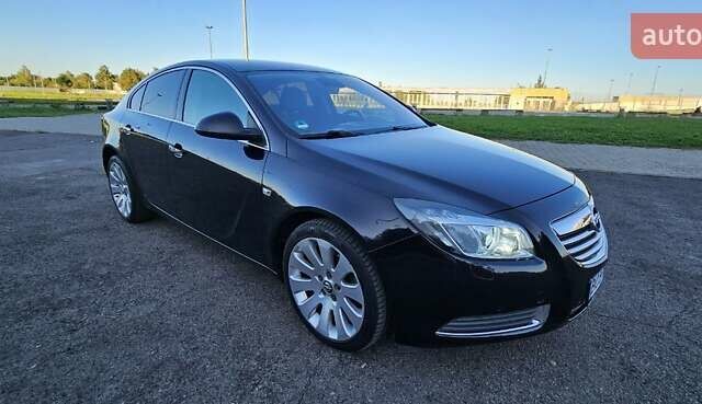 Чорний Опель Інсігнія, об'ємом двигуна 2 л та пробігом 182 тис. км за 8300 $, фото 5 на Automoto.ua